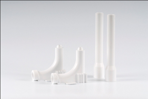 8377958: Bøyefikstur hvit for radiatortilkobling 15/25 mm